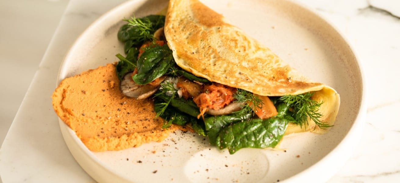 Picture of a plate containing a spinach omelet